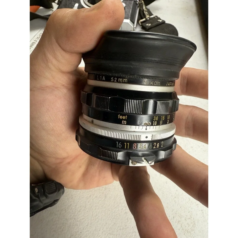 Nikon Nikkor-H Auto 1:2 f=50mm Lens With Collapsible Rubber Lens Hood 52mm